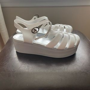 White platform jelly shoes